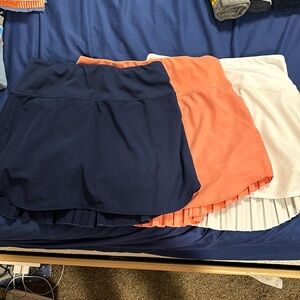 3 pack Amazon golf skirts.